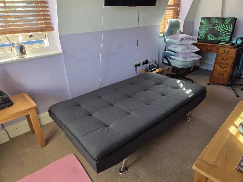 New condition 3 seata charcoal grey sofa bed