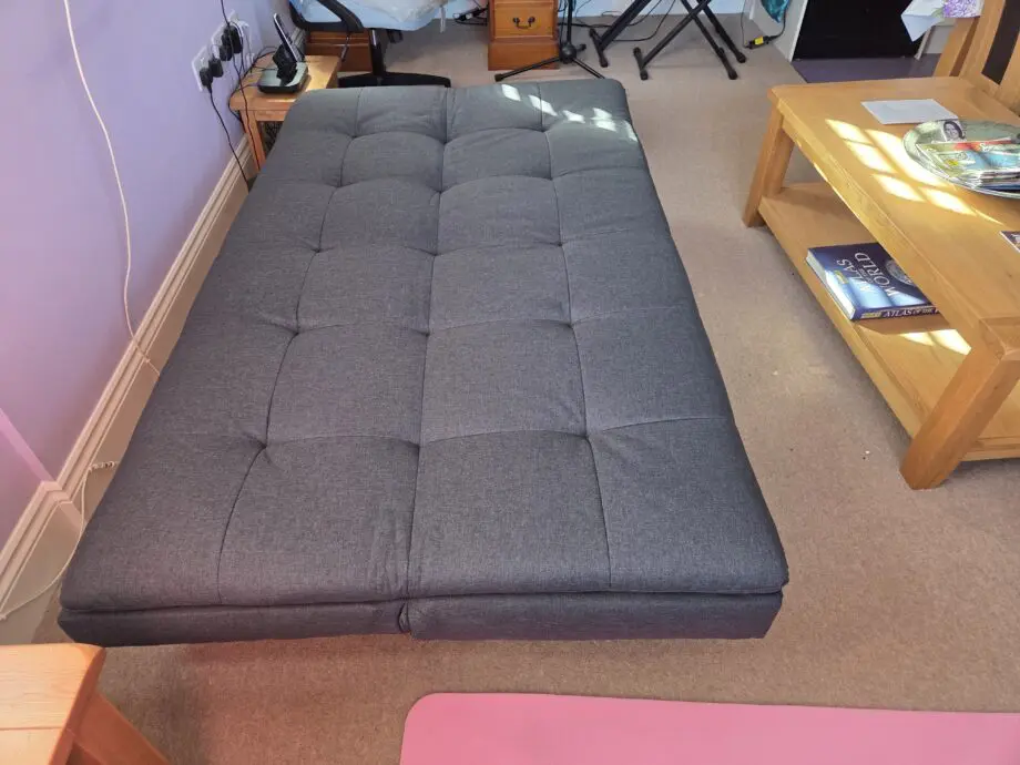 New condition 3 seata charcoal grey sofa bed