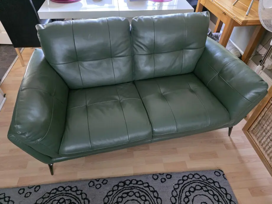 DFS Green leather 3 and 2 seater sofas.
