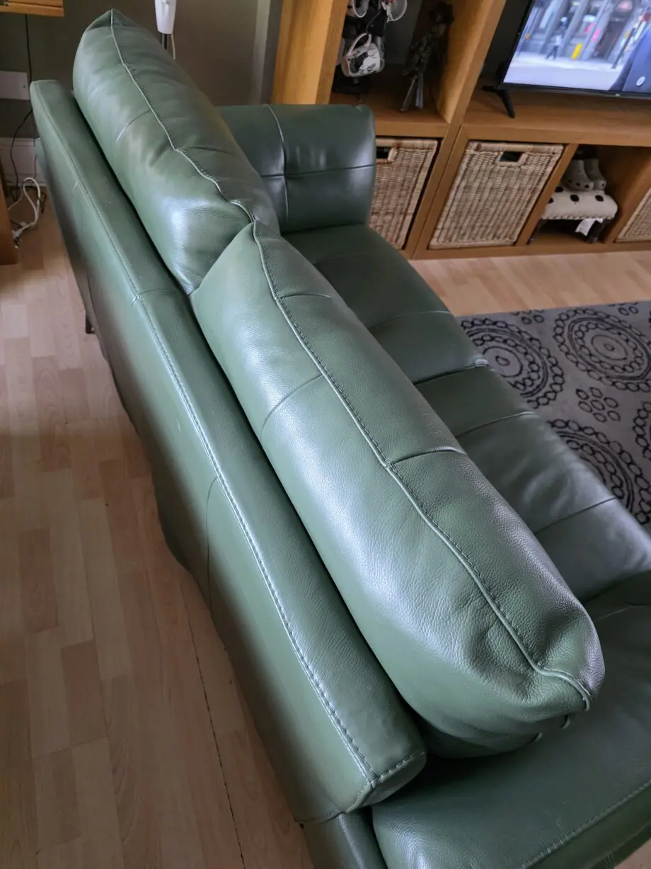 DFS Green leather 3 and 2 seater sofas.