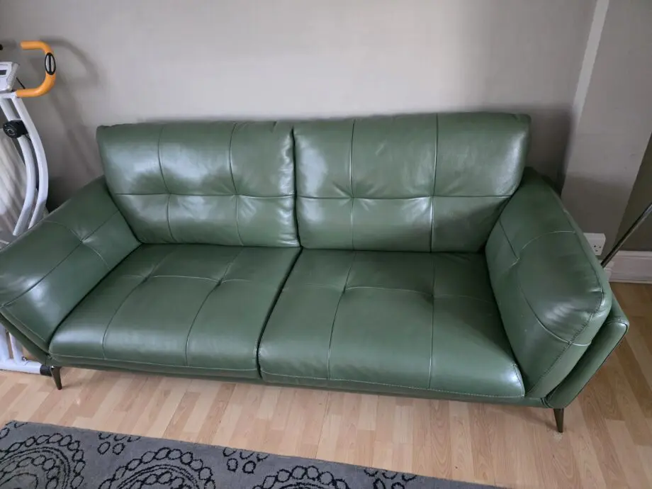 DFS Green leather 3 and 2 seater sofas.