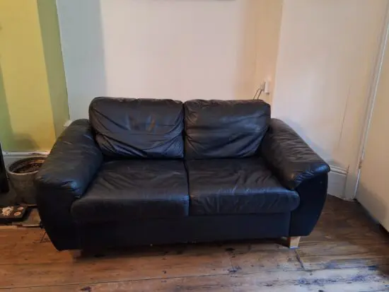 2 seater black leather sofa