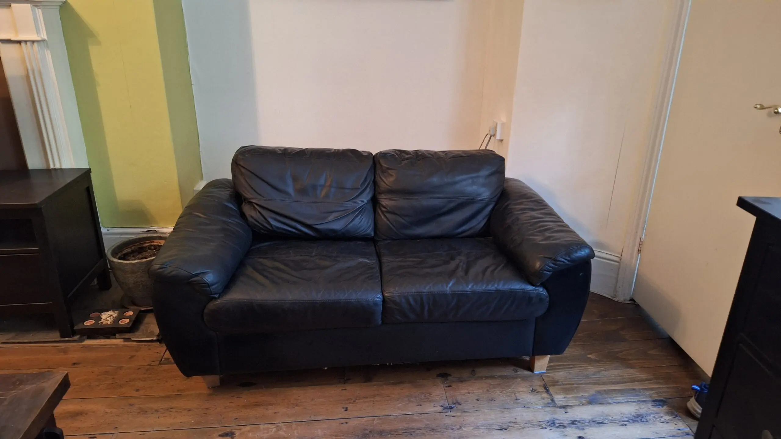 2 seater black leather sofa