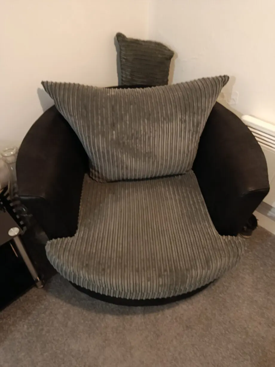 Grey swivel cuddle chair