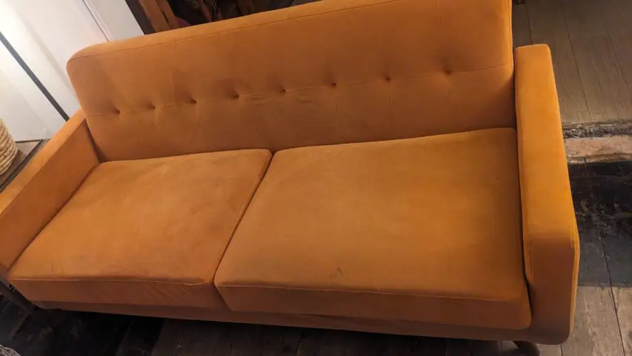 Burnt orange Clarence Daals 3 seat sofa
