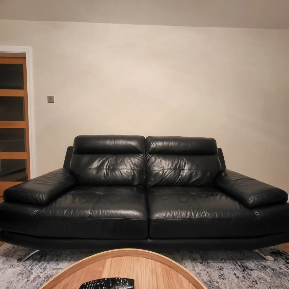DFS black leather 3 seater sofa and matching chair