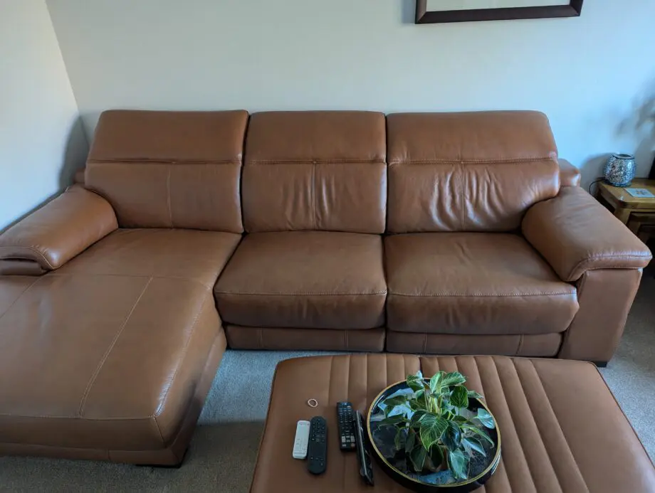 Sofology metz cognac leather. Power recliner and power headrest