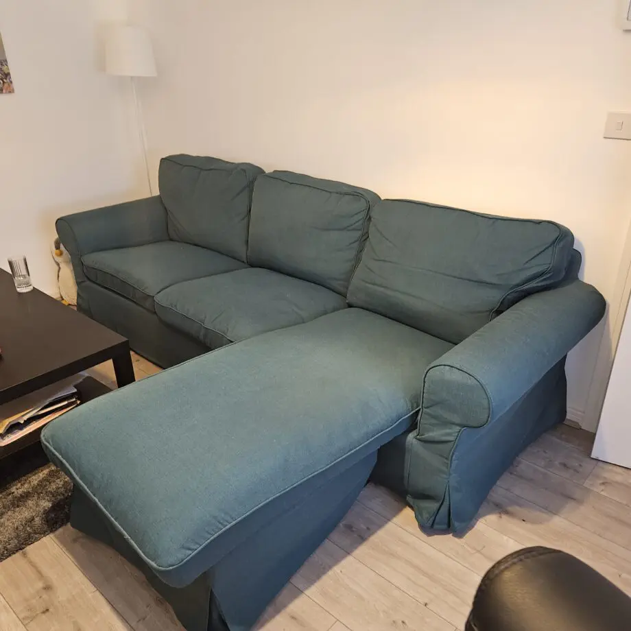 Dark Green Ikea 3 seater sofa with chaise longue