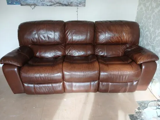 Harveys soft brown real leather sofa set, comprising 3 seater electric reclining sofa and a manual reclining armchair