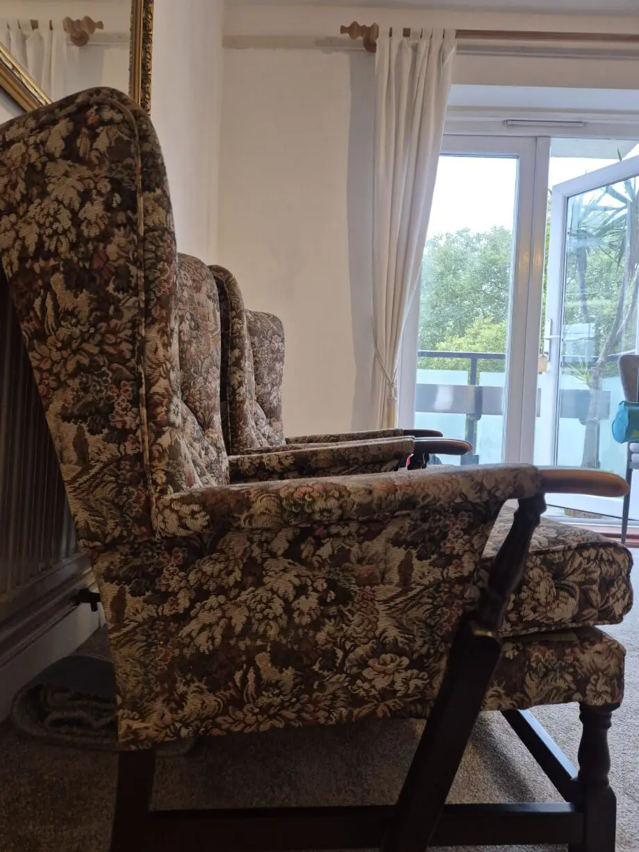 2 old vintage chairs well preserved with floral pattern.