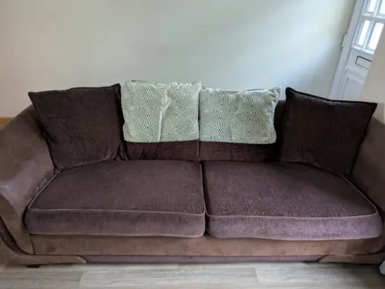 Brown 3/4 seater sofa