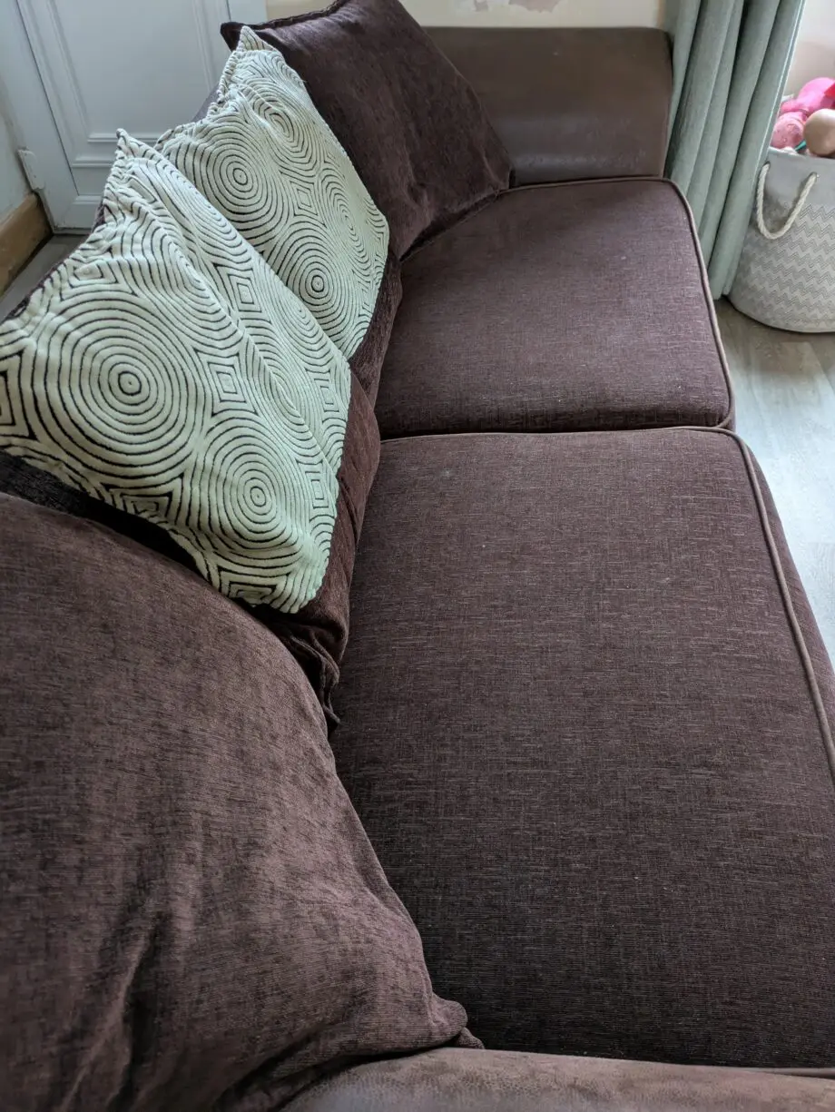 Brown 3/4 seater sofa