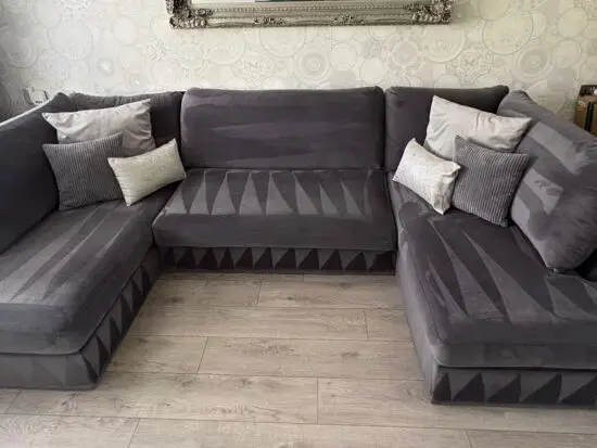 Grey velvet effect U shaped sofa