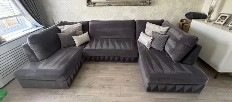Grey velvet effect U shaped sofa