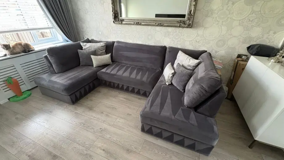 Grey velvet effect U shaped sofa
