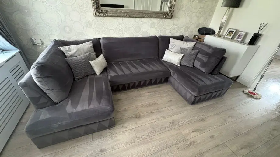Grey velvet effect U shaped sofa