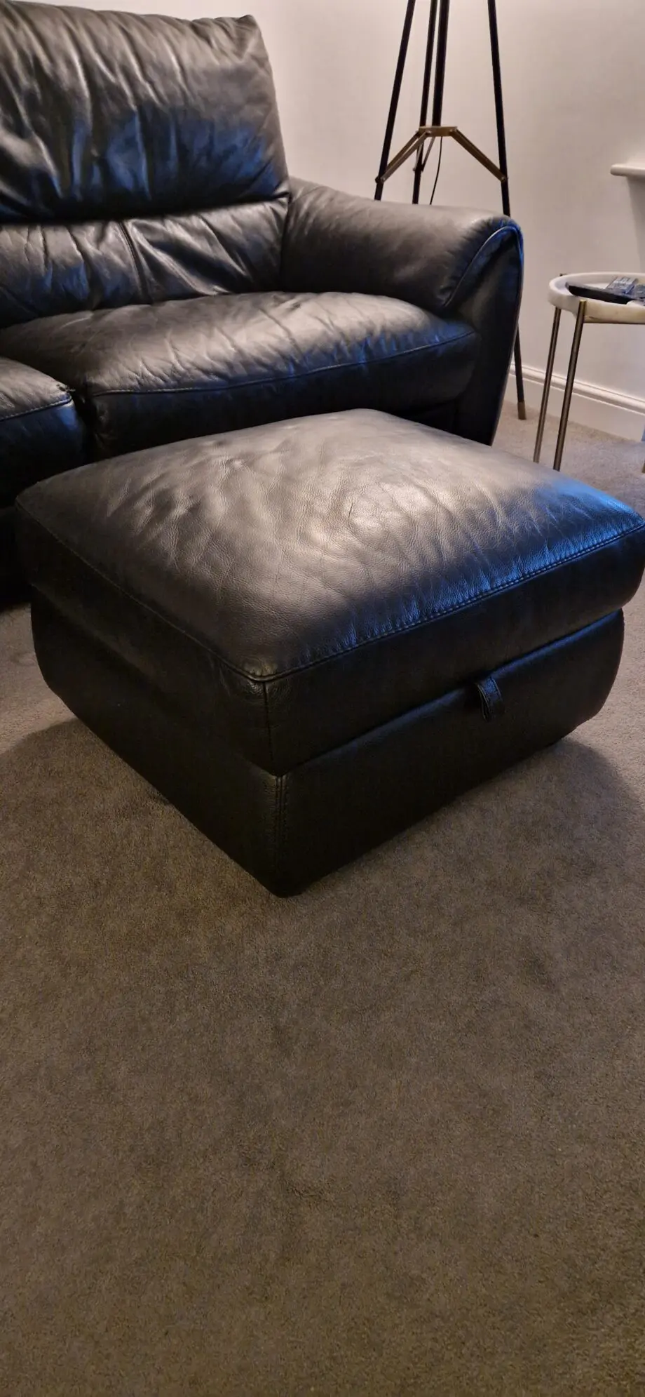 DFS black leather recliner sofas and footstool