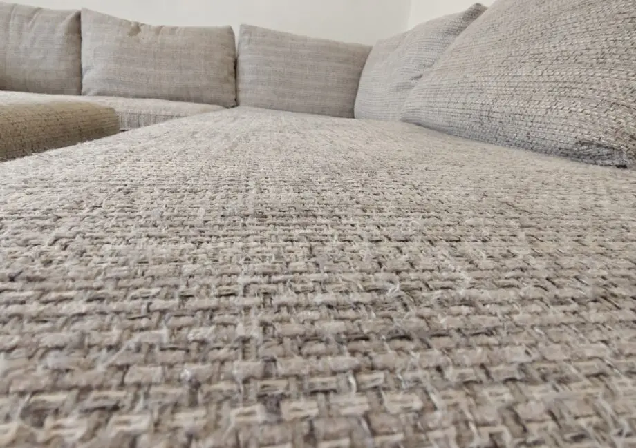 Grey corner sofa and foot stool