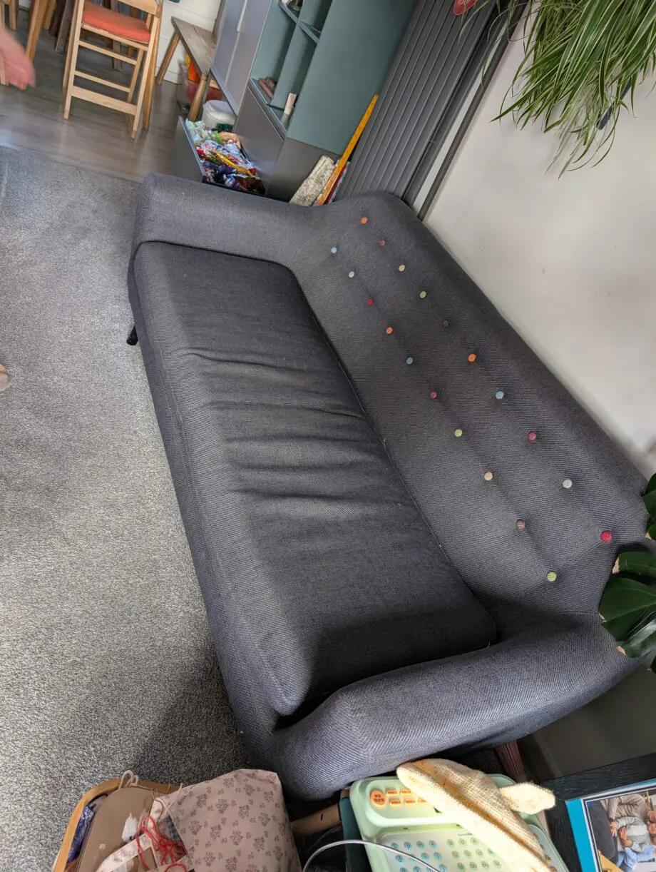 Made dark blue sofa