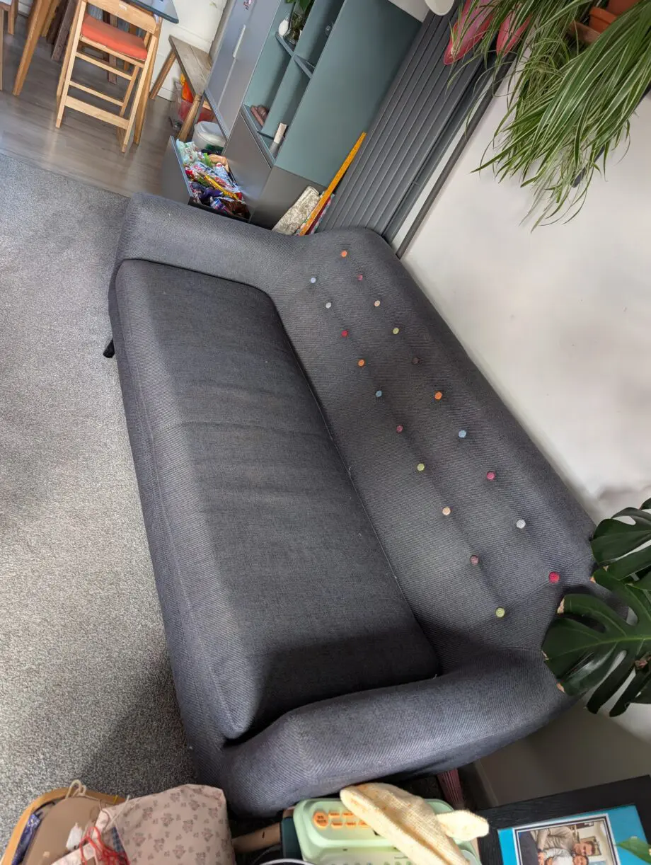 Made dark blue sofa