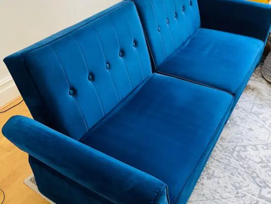 Blue velvet sofa bed