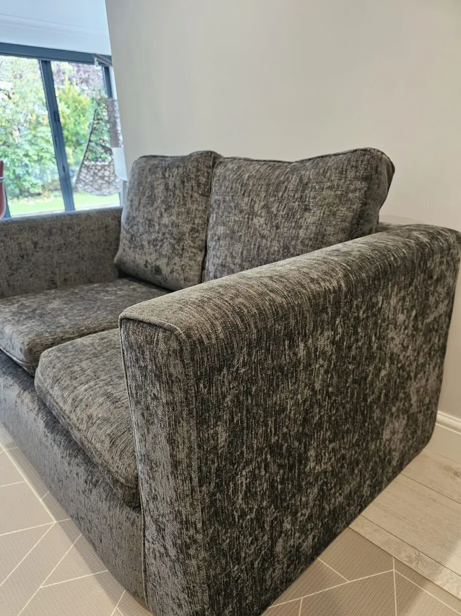 Grey 2 seater sofa with removable cushion covers
