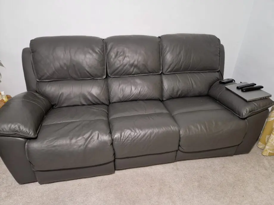 Grey leather sofa set with electric recliner