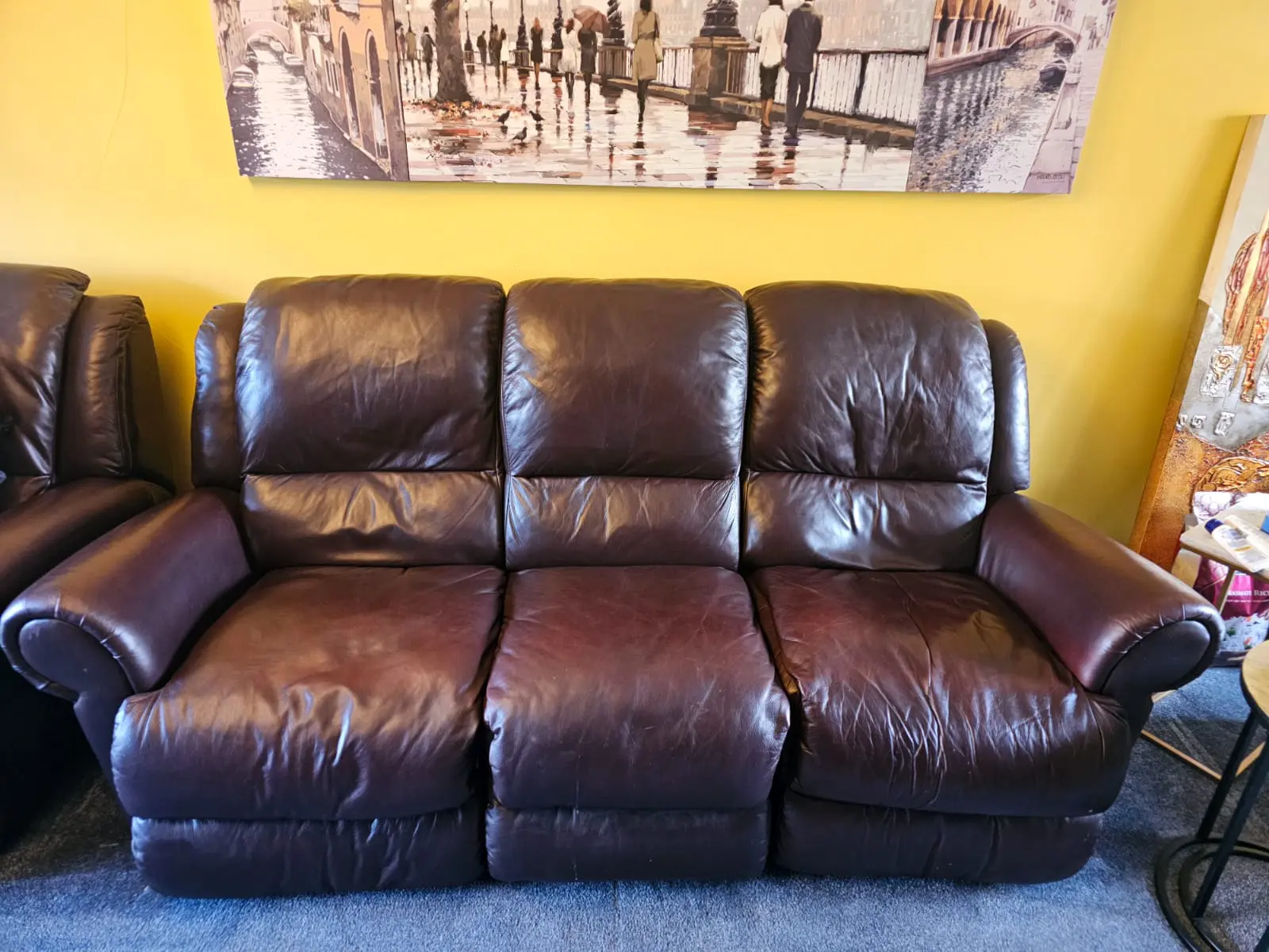 Brown three-seater sofa