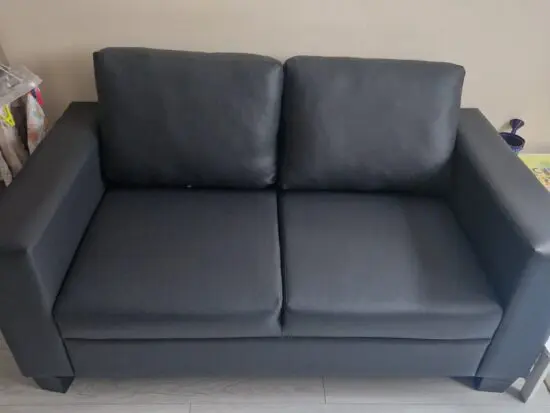 Two-place sofa grey