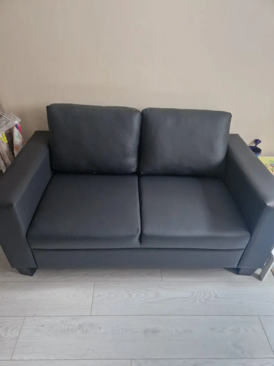 Two-place sofa grey