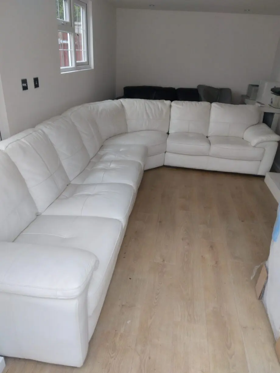 Leekes 7 seater leather corner sofa in stone / ivory
