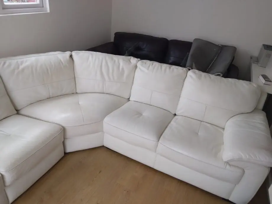 Leekes 7 seater leather corner sofa in stone / ivory