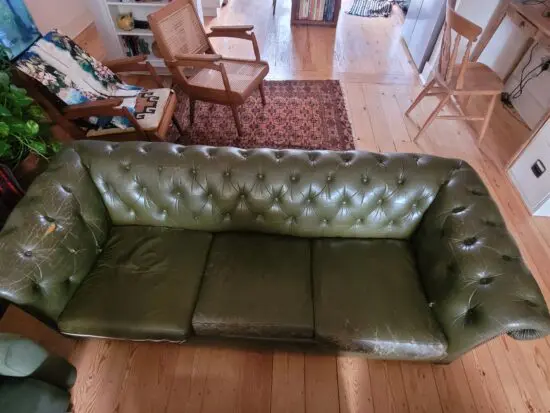 Green leather chesterfield sofa