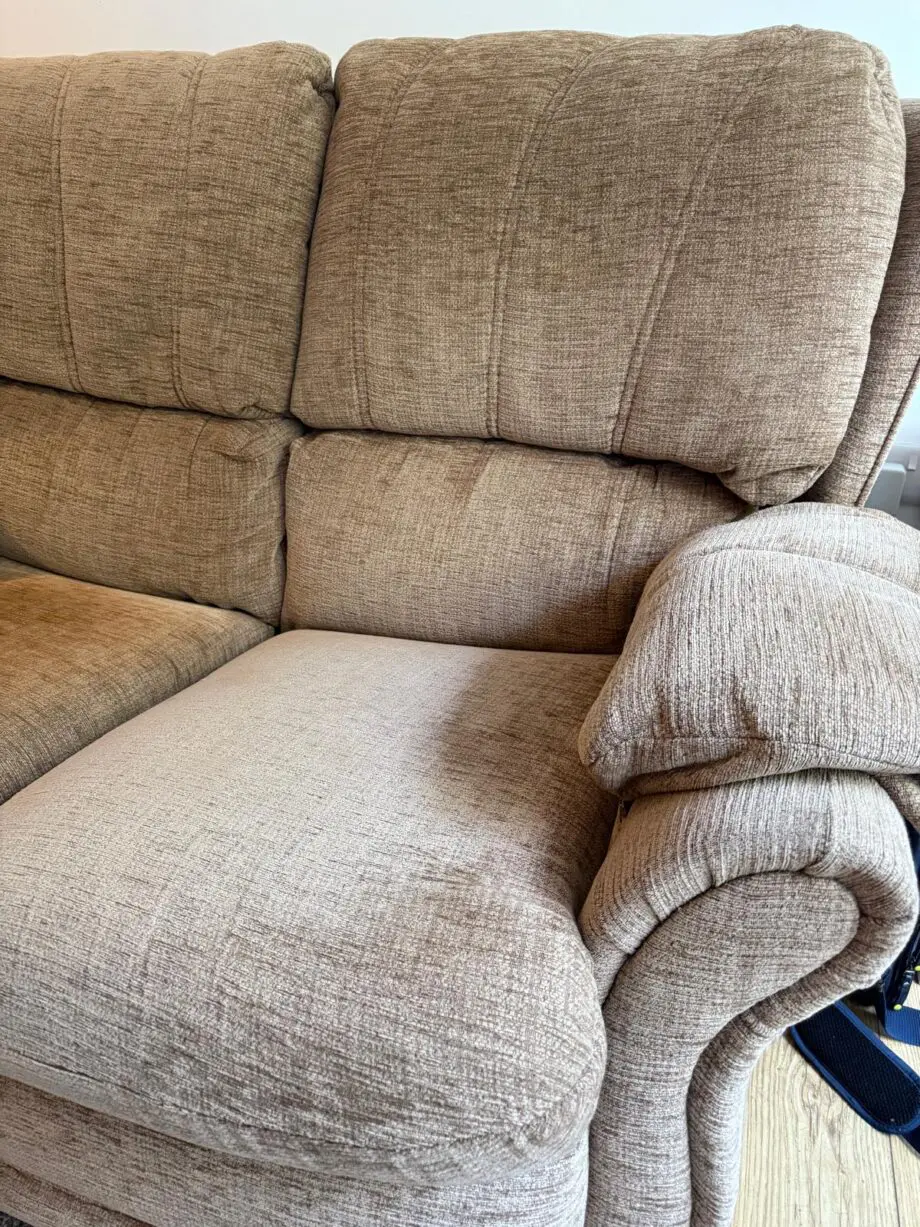 Beige two seater sofa