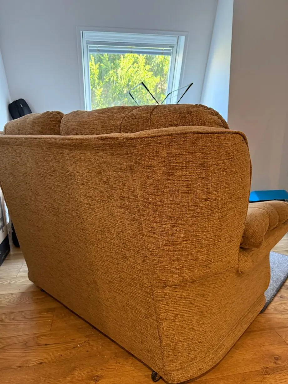 Beige two seater sofa