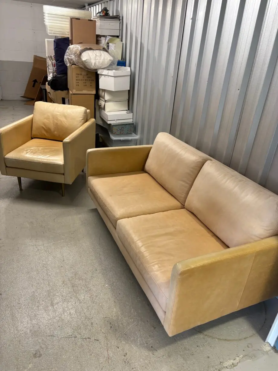 Italian leather, light tan designer sofa and chair (brass legs)