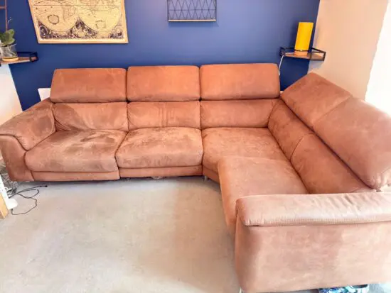 DFS Brown corner sofa with recliner and mobile head rests