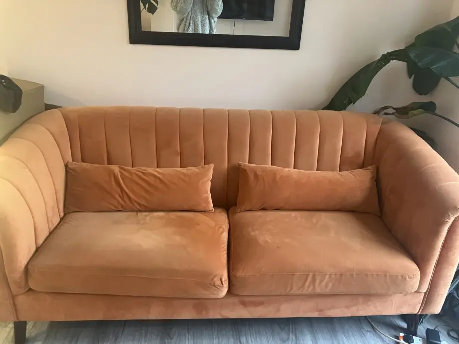 Orange velvet 3 seater sofa