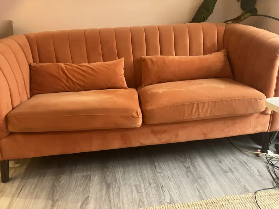Orange velvet 3 seater sofa