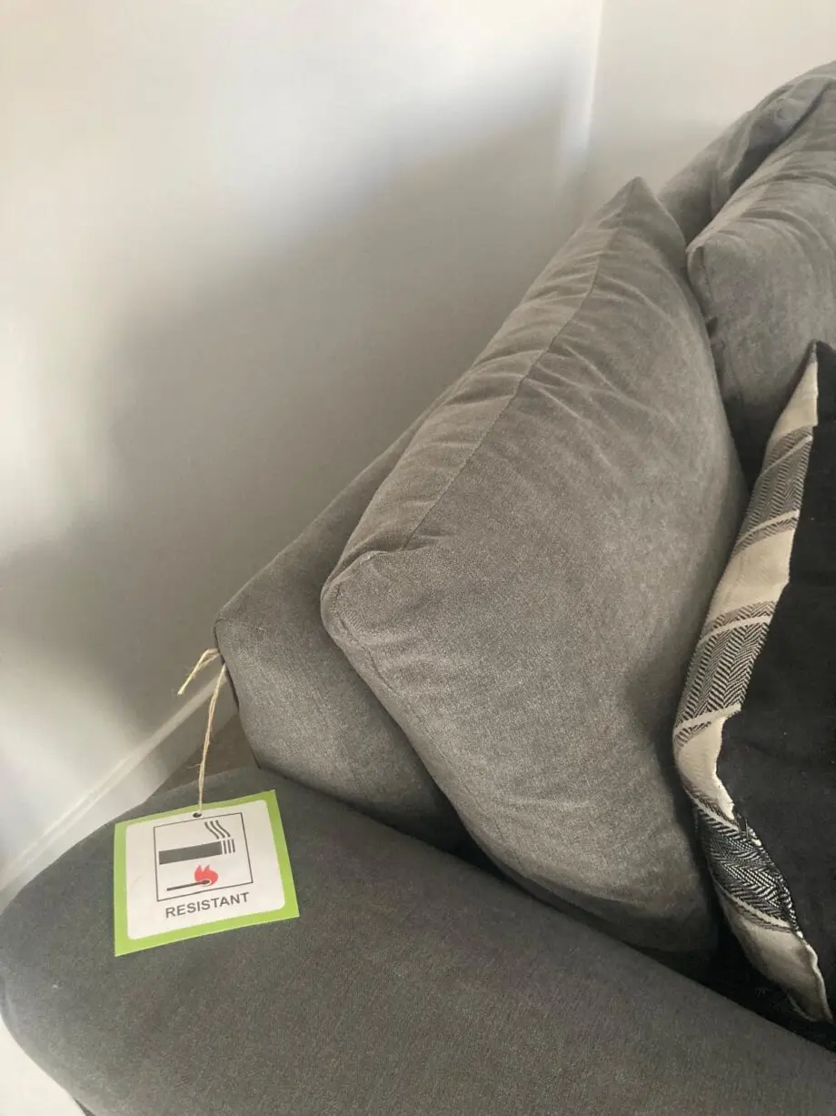 2 x Grey 2 seater scatter back sofas & fooststool
