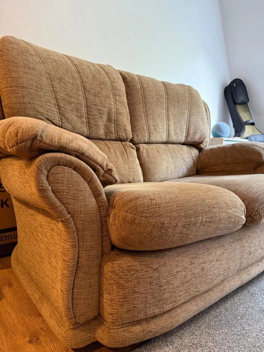 Beige two seater sofa
