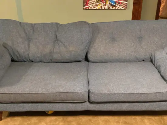 Teal DFS French Connection sofa and cuddler