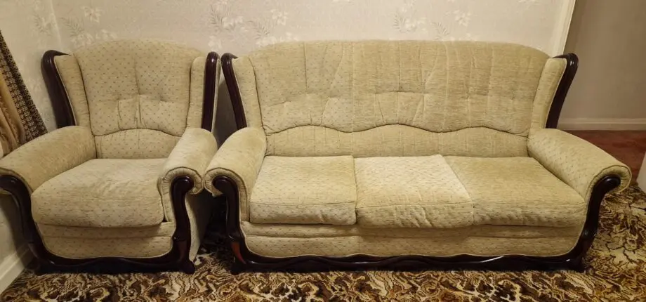 4 seater beige sofa with brown wood surround