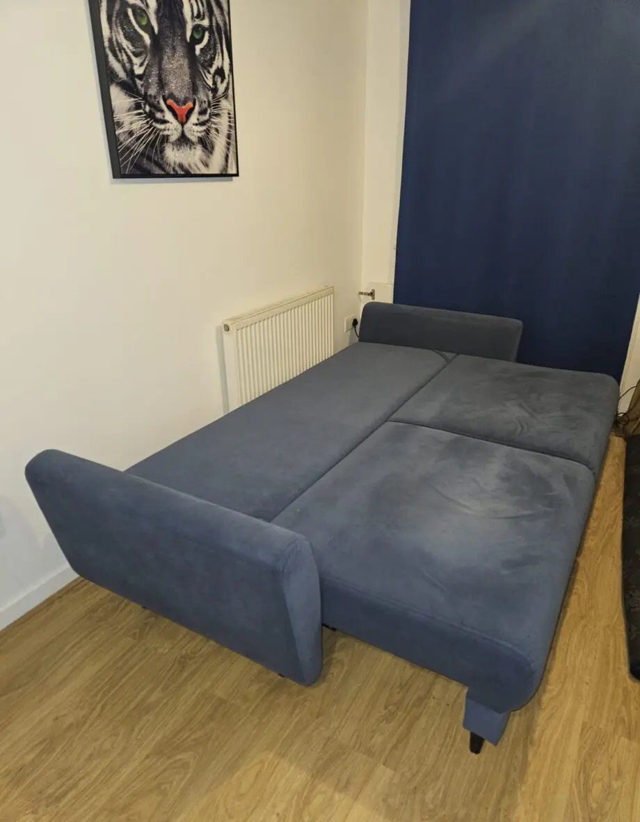 Nice 3 seater blue sofa bed