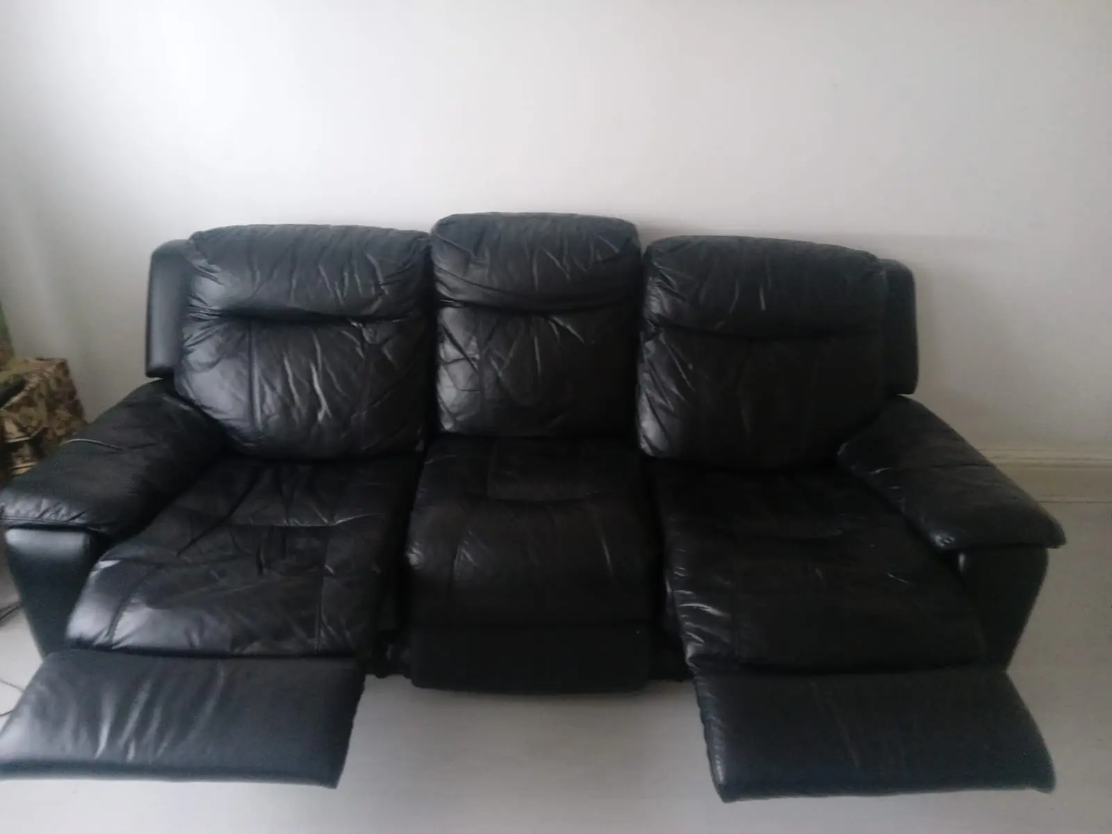 DFS 3 seater manual recliner leathersofa
