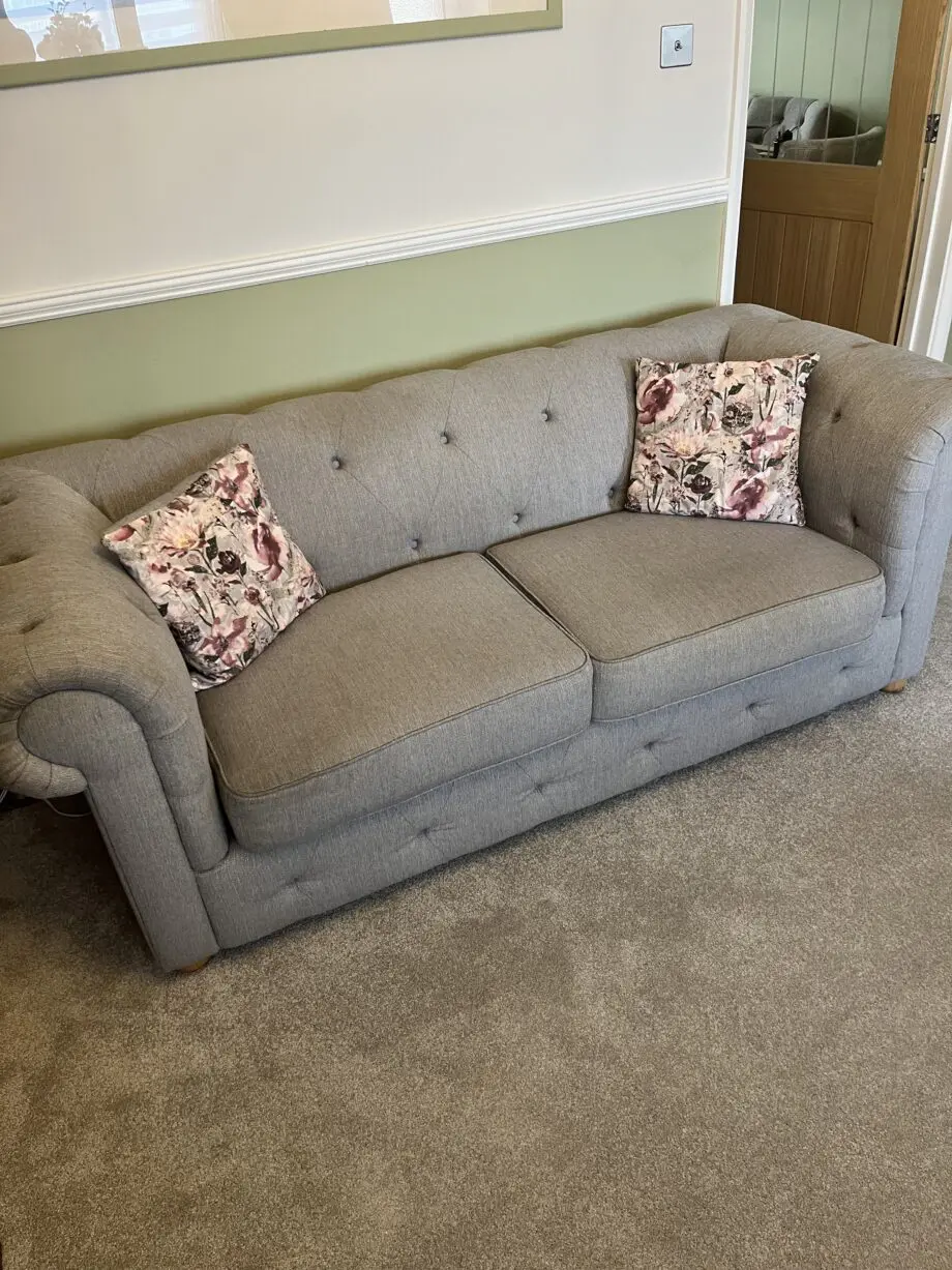Two lovely grey fabric sofas