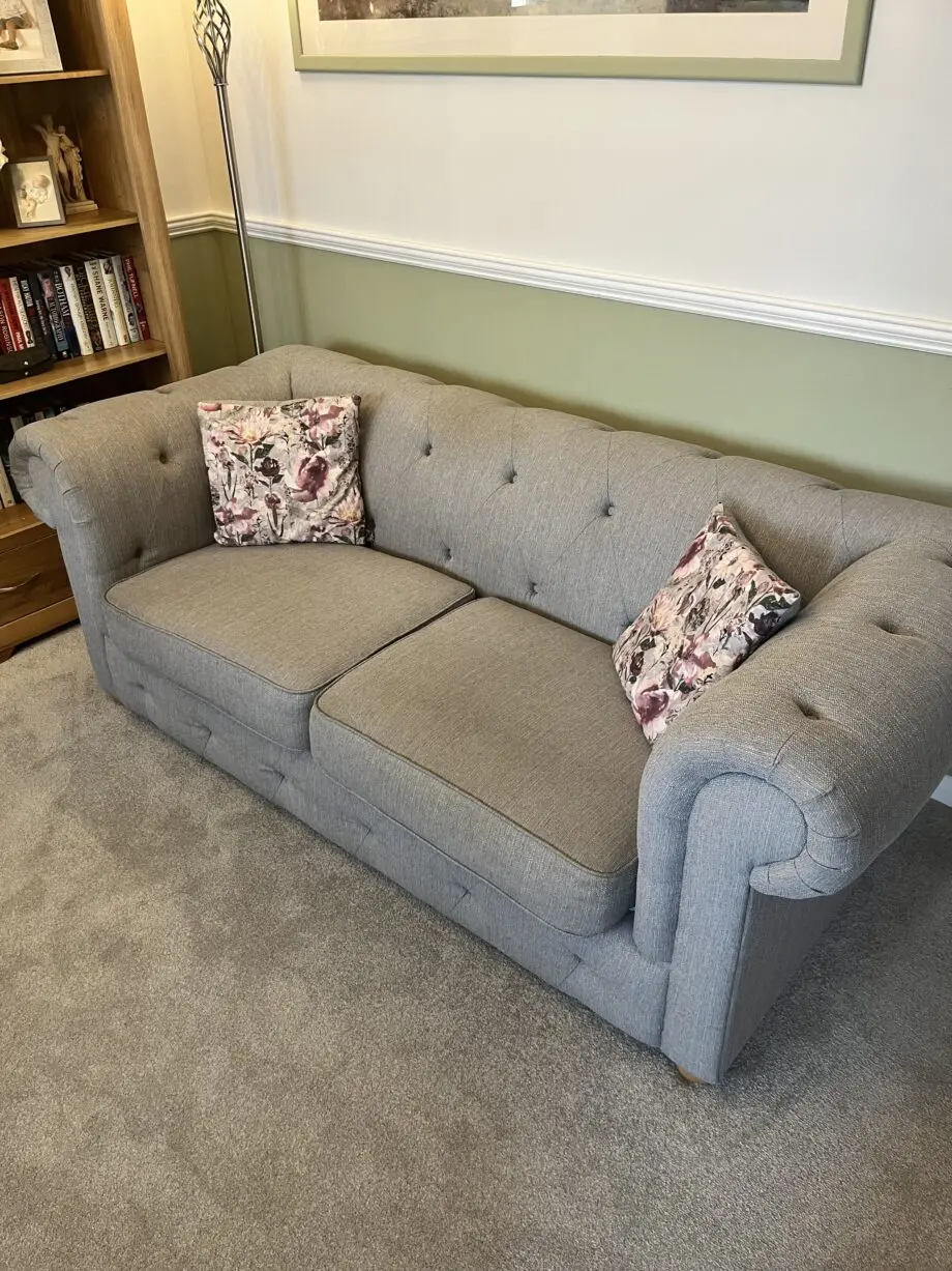 Two lovely grey fabric sofas
