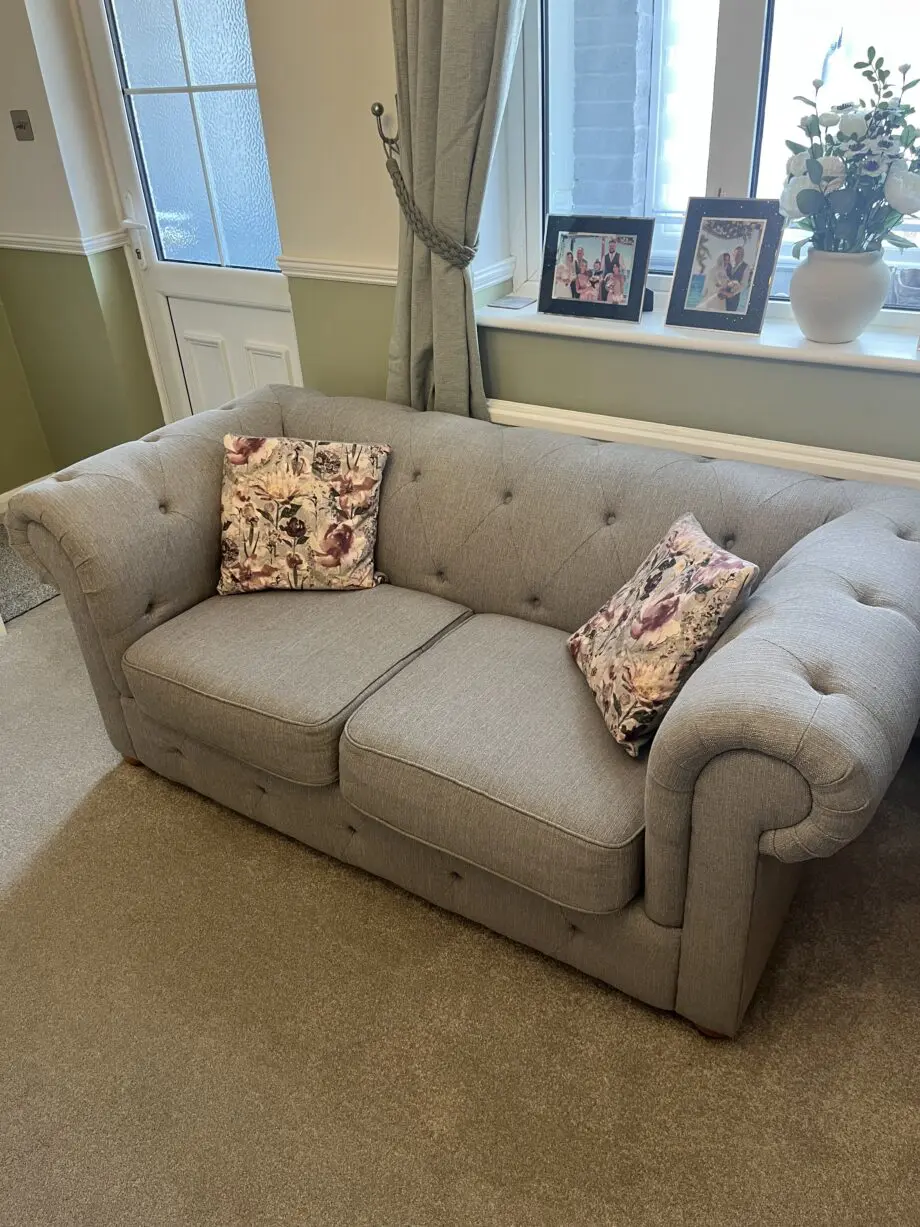 Two lovely grey fabric sofas