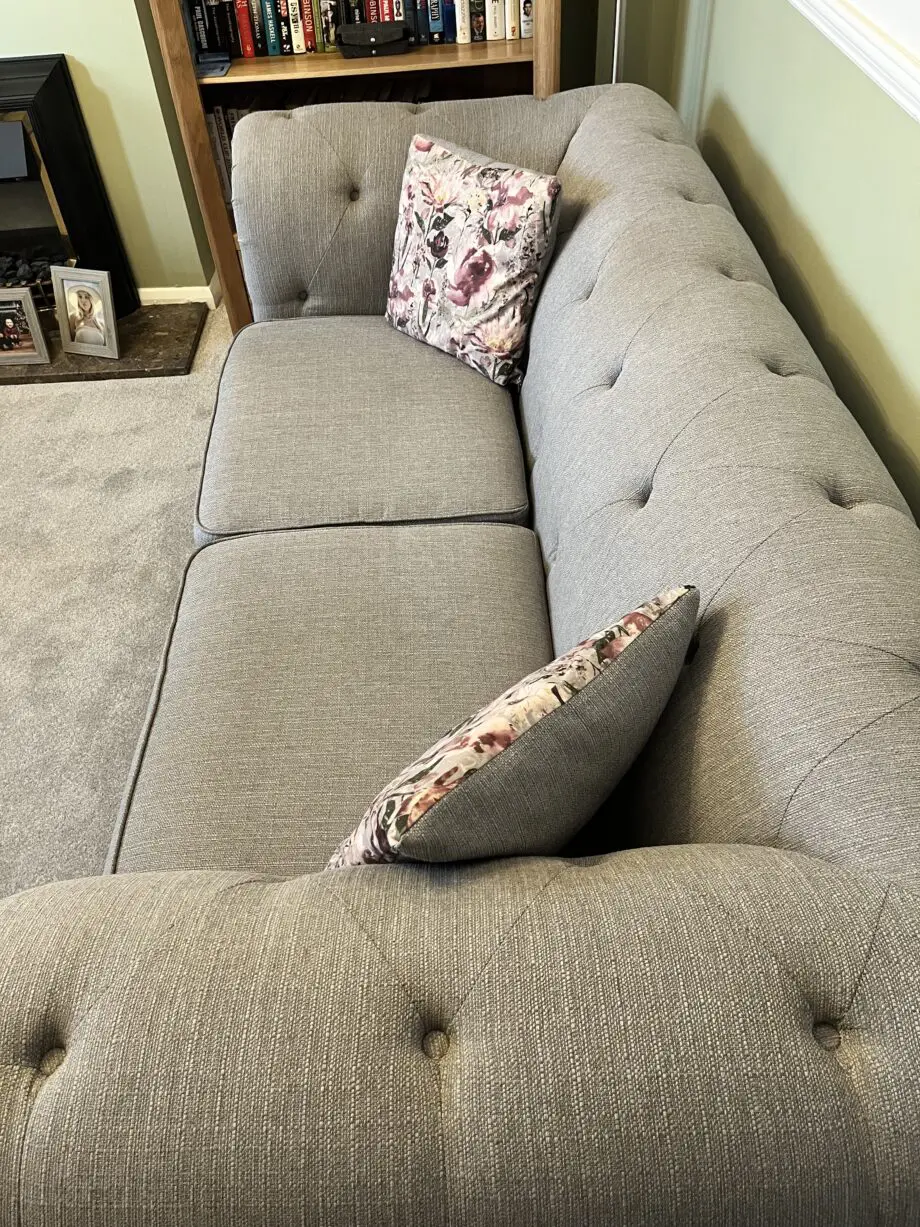 Two lovely grey fabric sofas