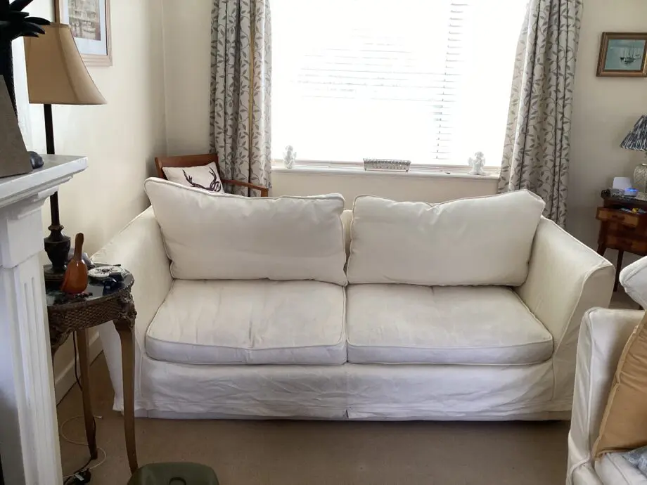Cream 3 seater sofa